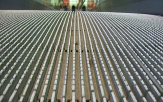 NON-SLIP COATING FOR ESCALATORS